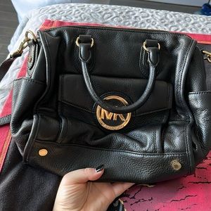 Michael Kors Black bag. Adjustable strap.